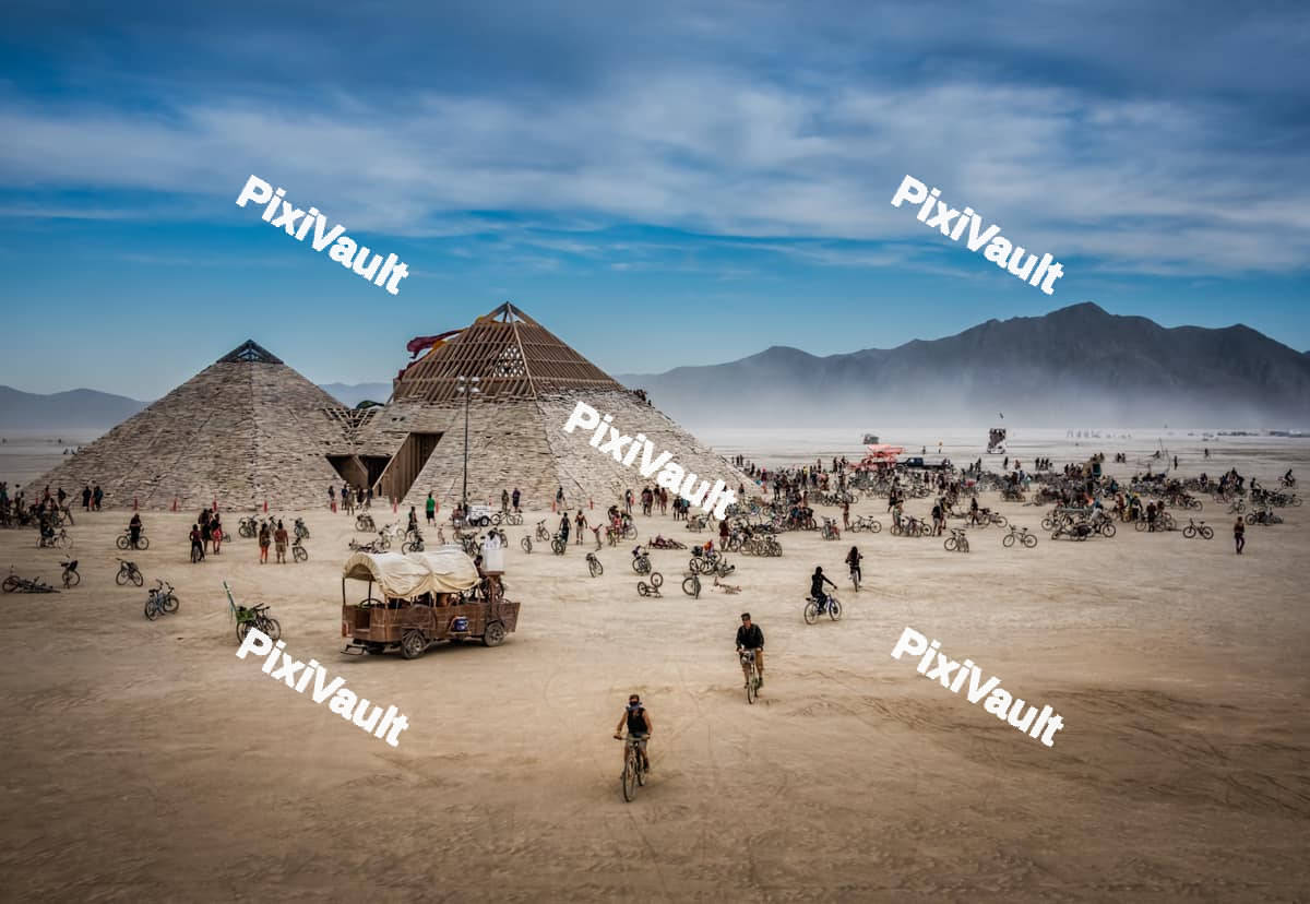 Pyramids with people on bicycles